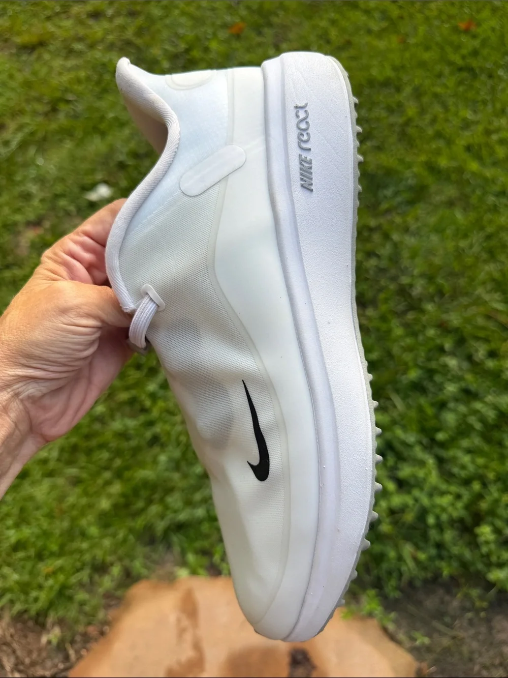Nike Men’s White Slip-On Sneakers with Black Swoosh